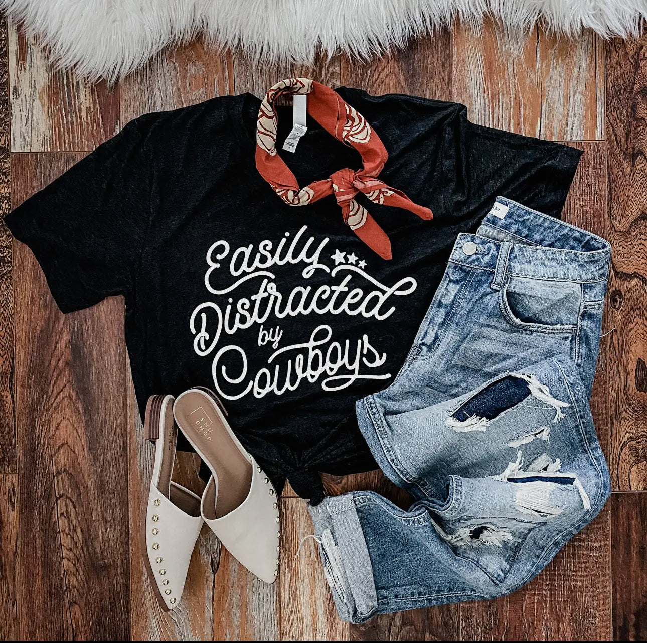 Easily Distracted By Cowboys Tee in black